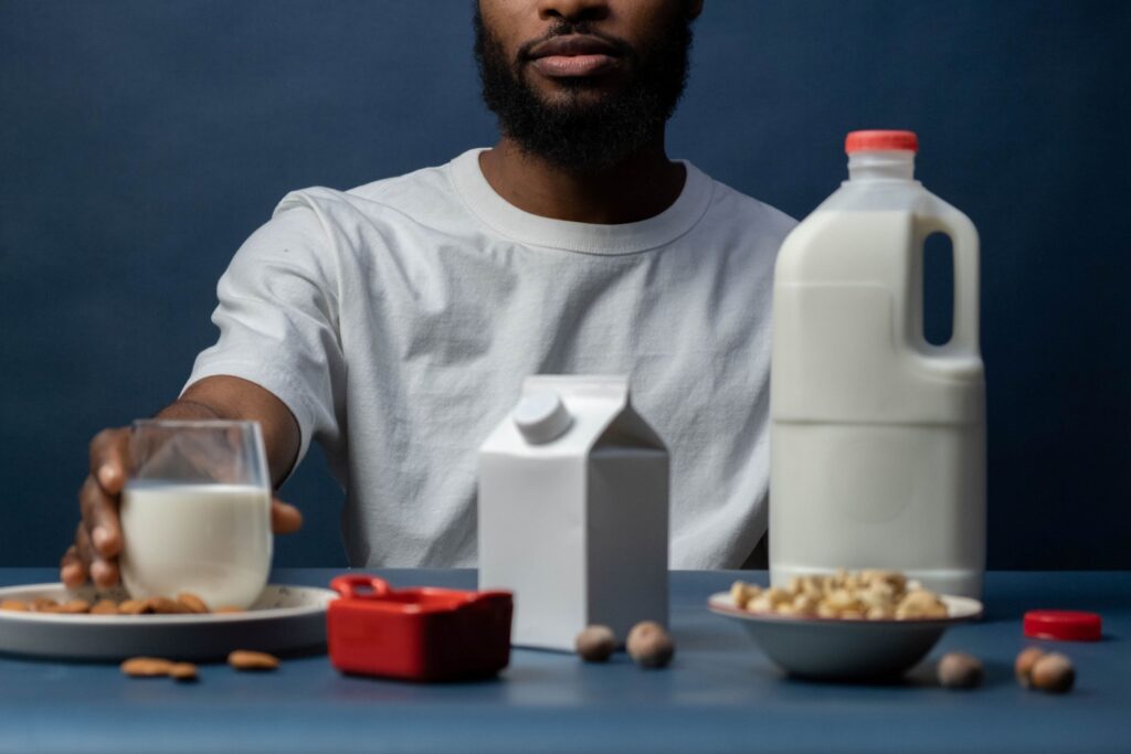 Man at table with allergy foods.